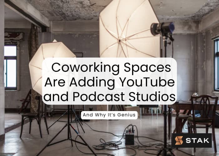 Professional YouTube and podcast studio setup with lights, microphones, and chairs in a coworking space, showcasing creative workspaces