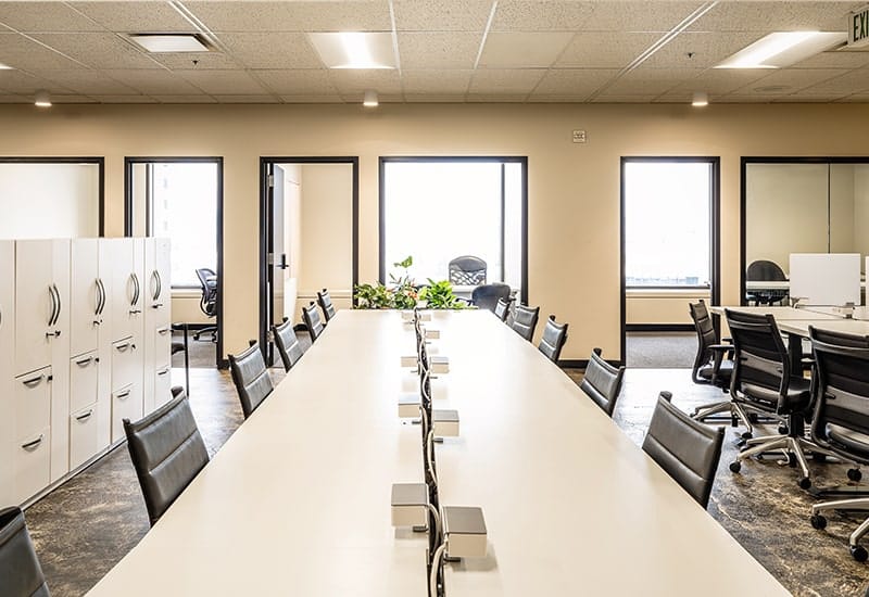 Dedicated desk office with secure storage cabinets at STAK Space Oakland