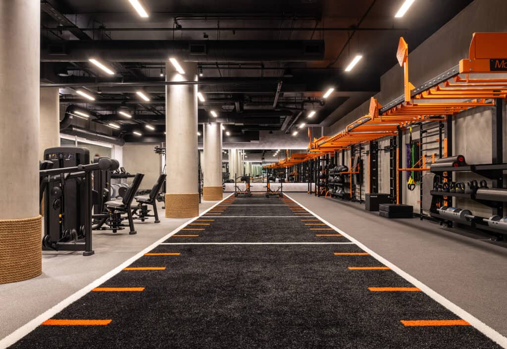 MoveStrong fitness center at 1900 Broadway with a turf lane and training equipment