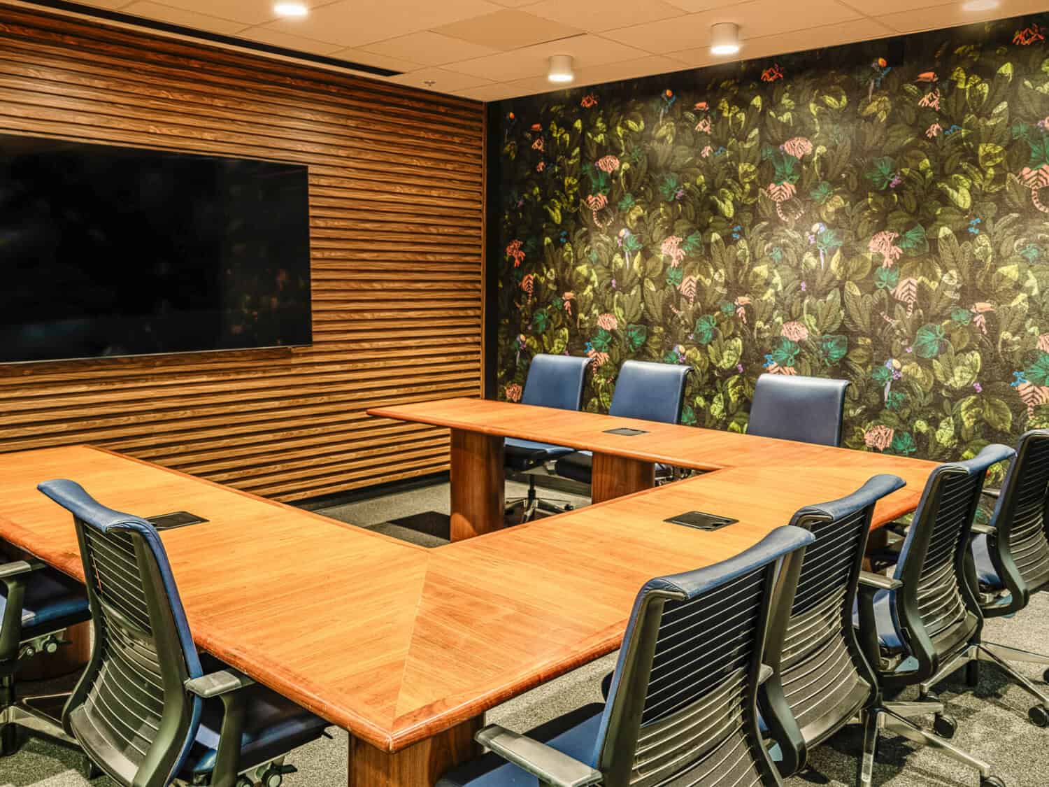 Conference room with wood table and display at STAK Space 1920 Broadway