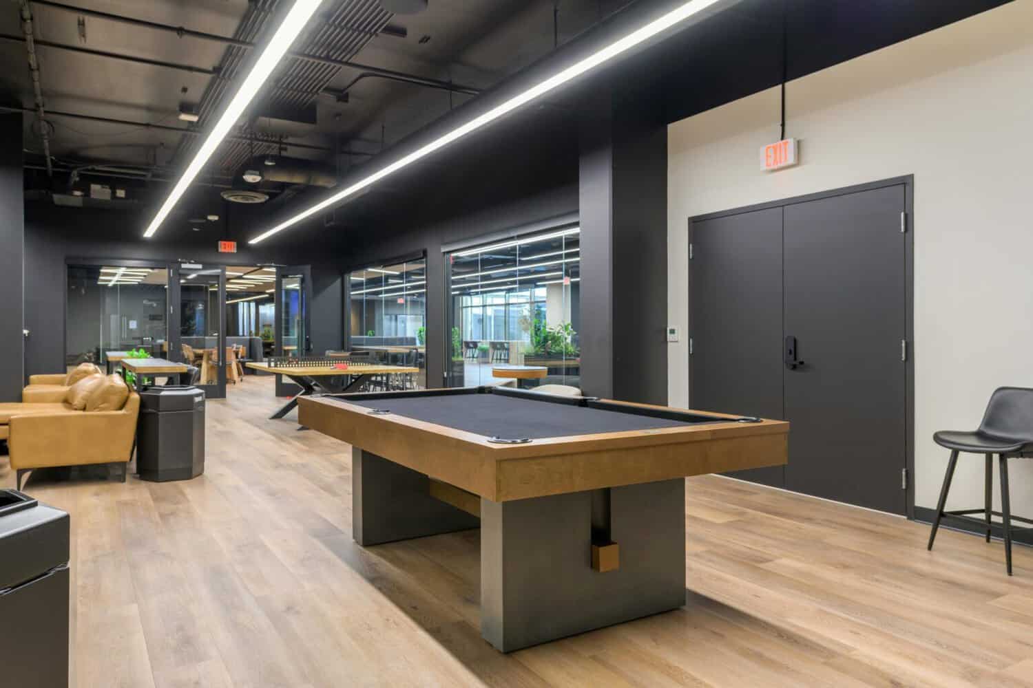 Member lounge and game area at STAK Space 1920 Broadway