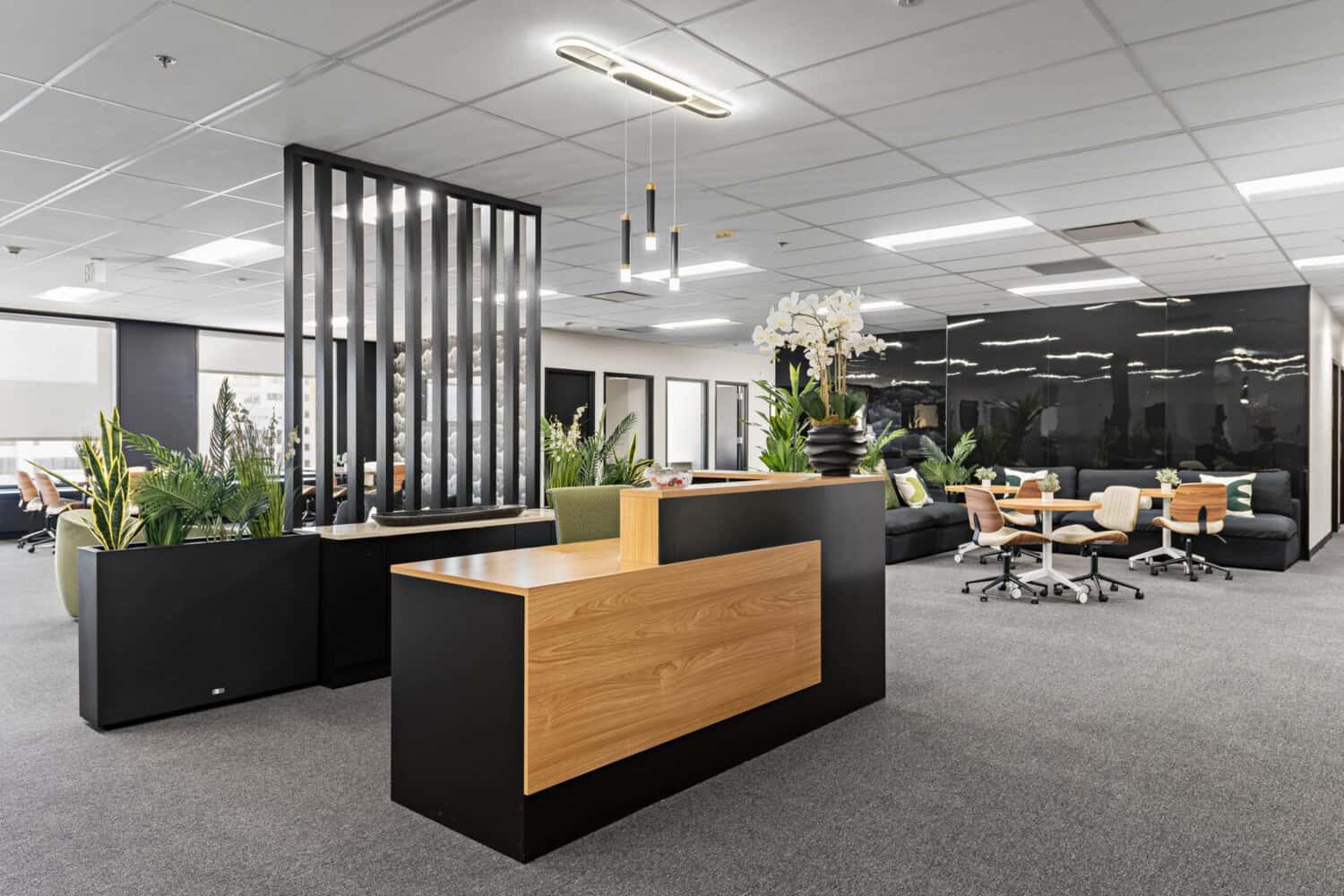 Reception desk and lounge seating at 1950 Franklin