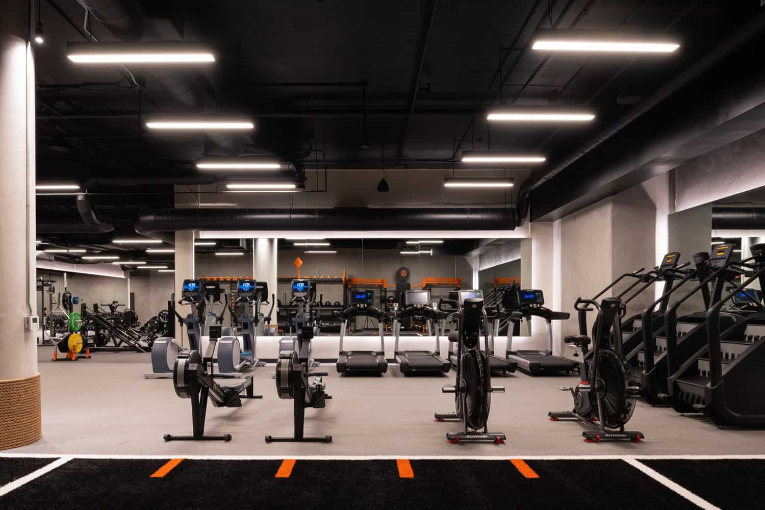 Cardio machines and treadmills in the STAK Space fitness center in Oakland
