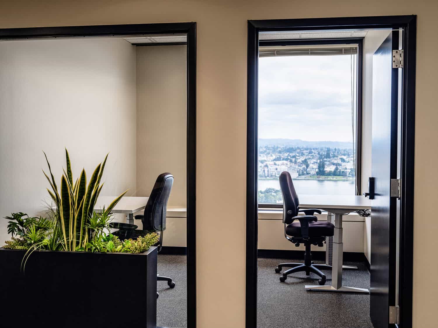 Private office with window views at STAK Space on the 1900 Broadway Campus