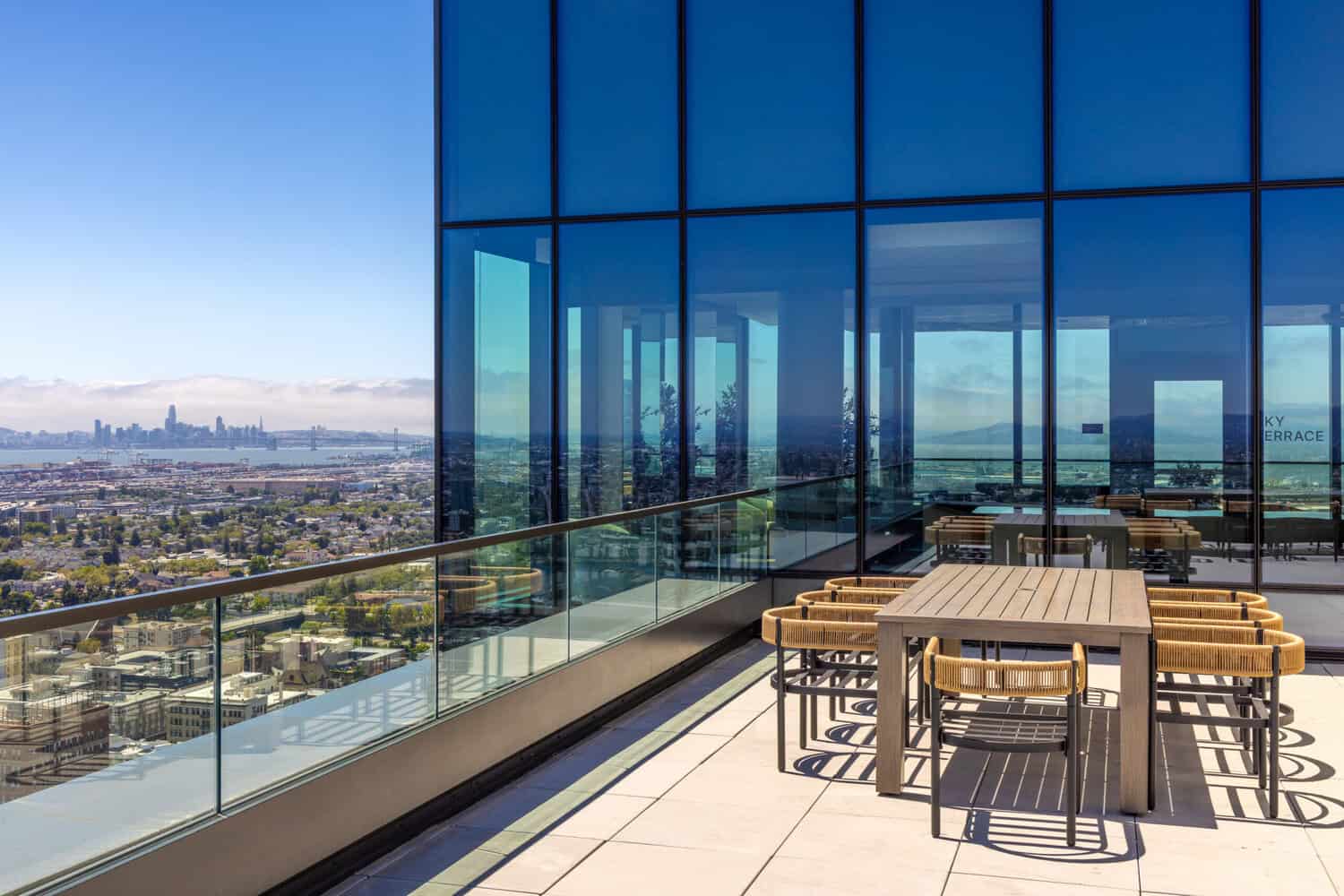Rooftop dining terrace with city views at 1900 Broadway in Oakland