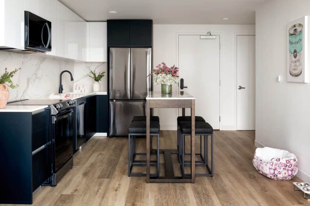Kitchen with an island in an apartment at 1900 Broadway in Oakland