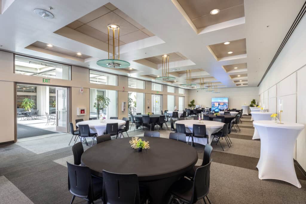 Dining room set for a catered corporate offsite at 1950 Franklin