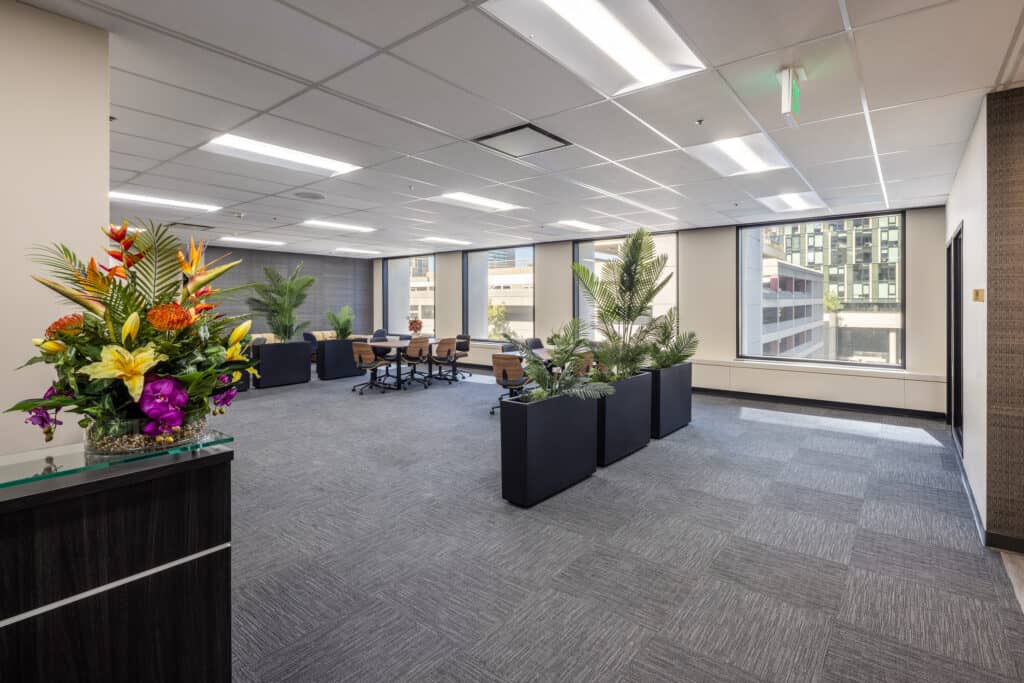 Renovated office suites in Oakland on Level 4 at 1950 Franklin, with reception desk and open workspace