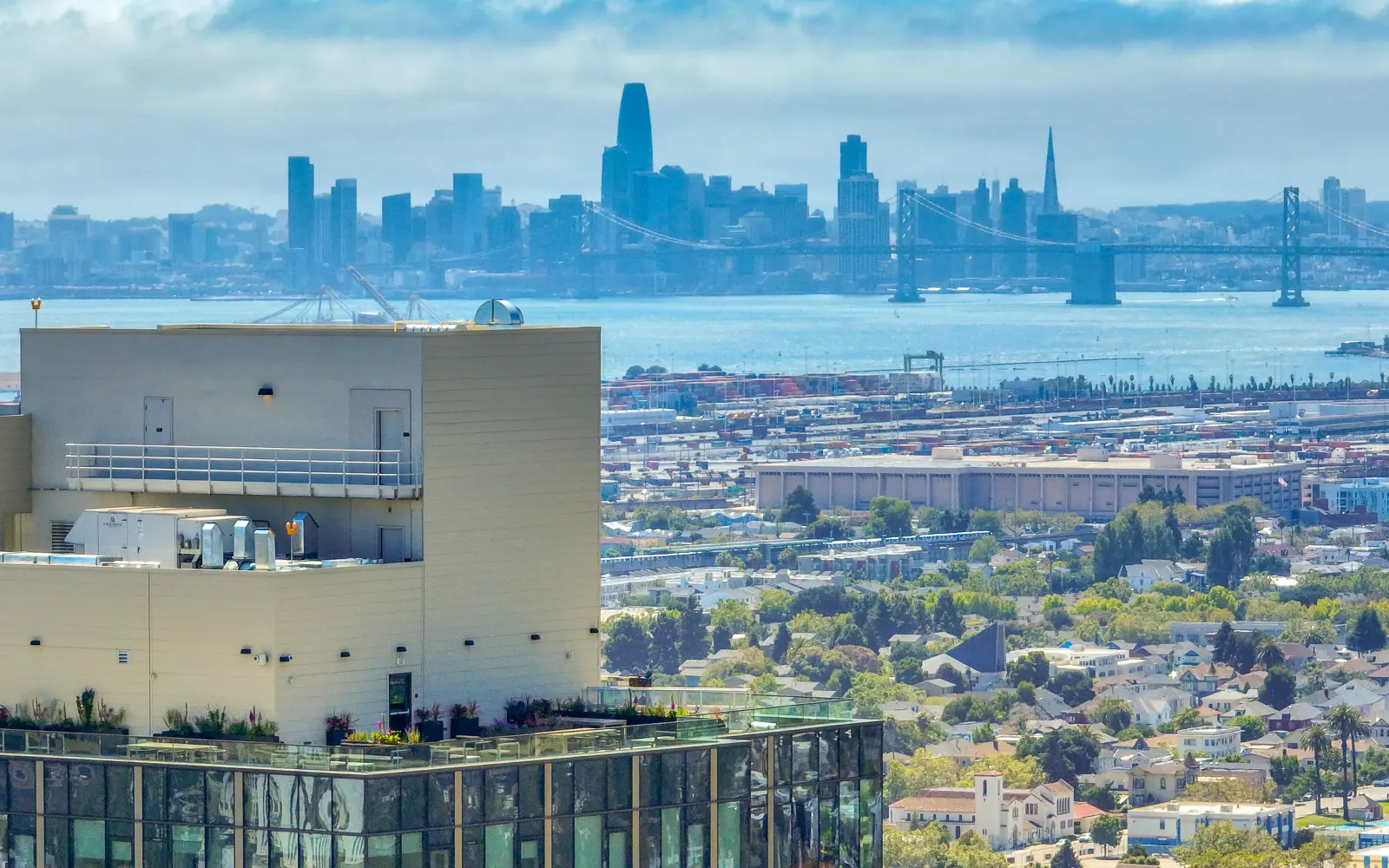 1900 Broadway residential tower rooftop with the San Francisco skyline beyond